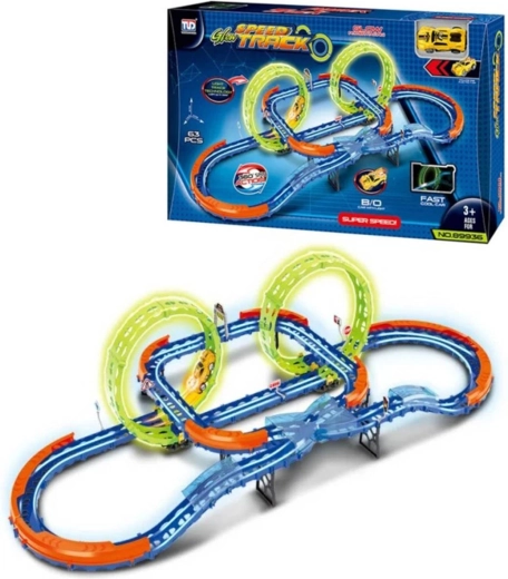 Circuit automobile lumineux dans le noir avec croisement et loopings, avec petite voiture LED