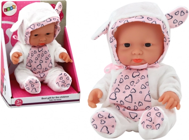 Petite poupée bébé en tenue blanche avec capuche et oreilles