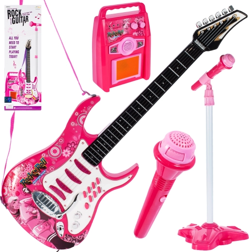 Guitare rose avec amplificateur et microphone