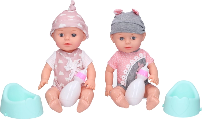 Bébé avec pot et biberon