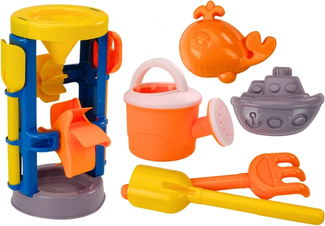 Grand set de plage avec moulin, pelle, râteau, arrosoir et moules
