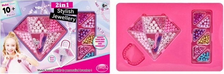 Perles colorées pour fabriquer des bijoux dans une boîte en forme de diamant