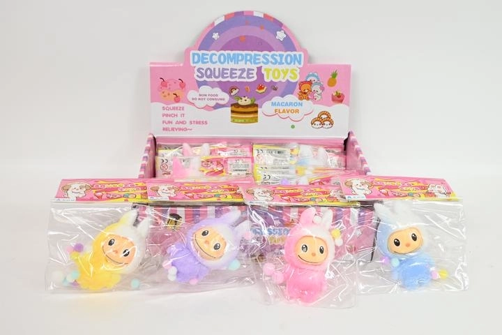 Gadget anti-stress à presser – petit lapin avec pompons