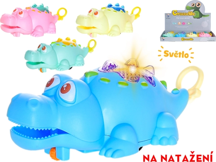 Crocodile à remonter roulant avec lumière 11 cm