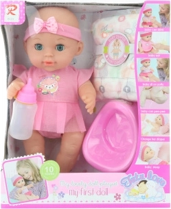 Bébé avec sons et pipi avec accessoires