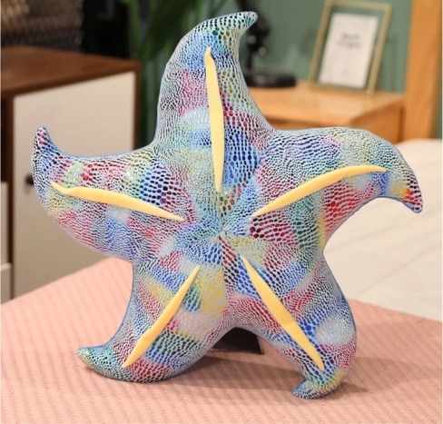 Coussin étoile en peluche bleu 20 cm