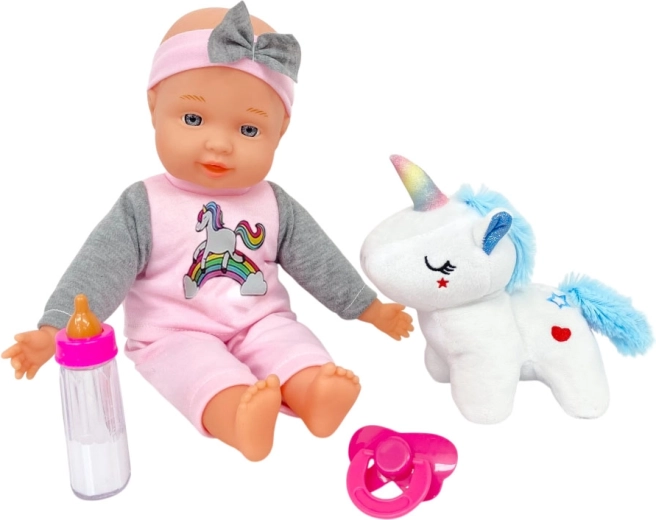 Bébé avec licorne en peluche 30 cm