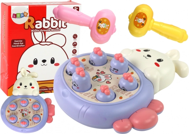 Jeu Whac-A-Mole violet avec carottes et lapin