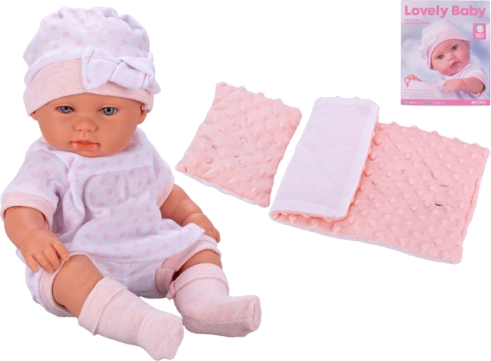 Poupée bébé au corps rigide 33 cm – rose, avec parures de lit