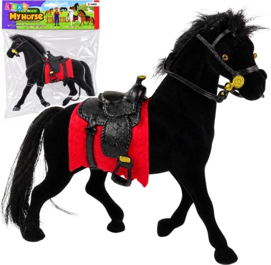 Figurine en velours d’un cheval noir avec tapis de selle rouge et selle