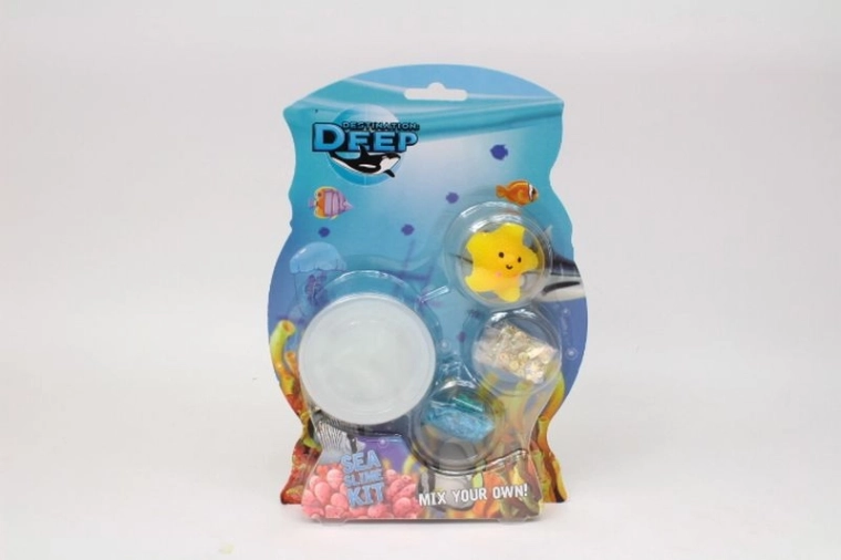 Slime en boîte avec créature marine et accessoires