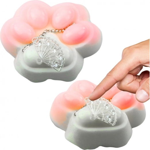 Jouet antistress patte de chat blanc avec ornements