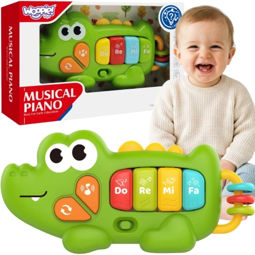 Piano interactif Woopie bébé crocodile avec sons et lumière 18m+