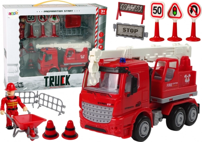 Ensemble de pompiers avec grue et panneaux de signalisation