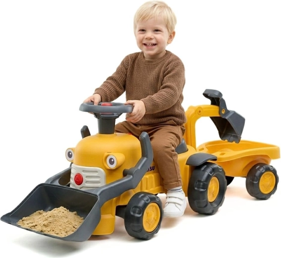 Porteur Komatsu avec chargeur, pelleteuse et remorque