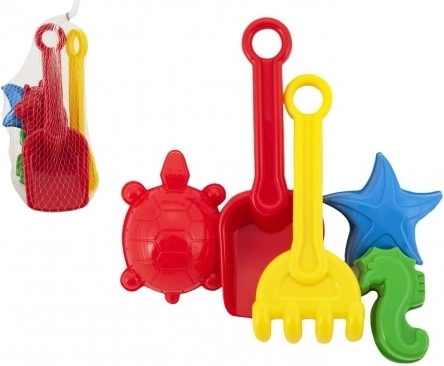 Set en plastique pour le sable avec pelle, râteau et moules dans un filet
