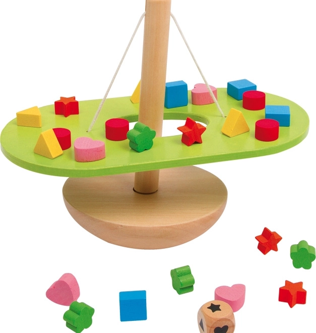 Houpa balançoire en bois pour l'équilibre moteur de Small Foot