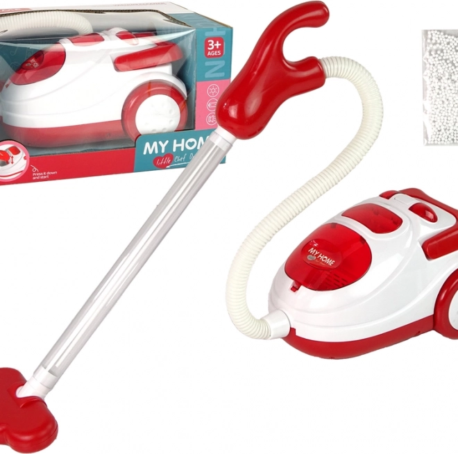 Aspirateur rouge pour enfants avec billes en polystyrène MY HOME