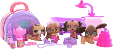ensemble de petits chiens avec accessoires pour jouer et prendre soin