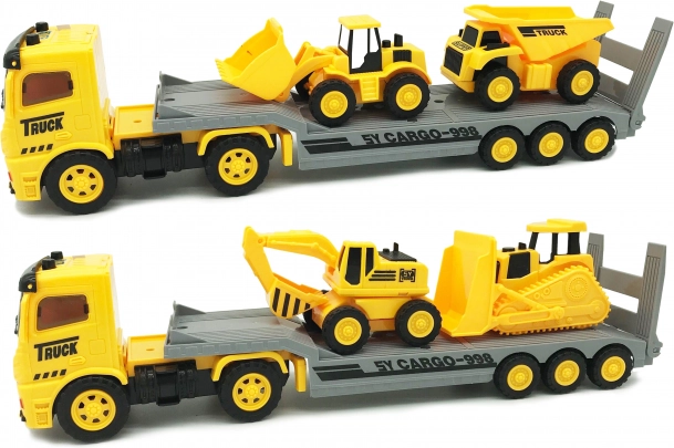 Camion porte-engins avec machines de construction