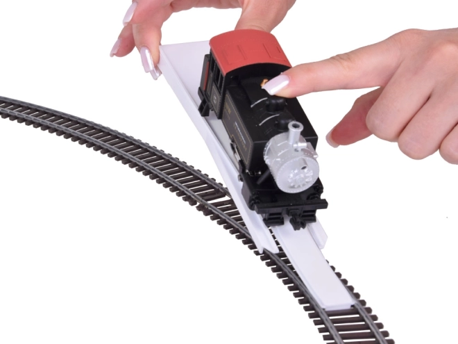 Ensemble de train électrique avec locomotive à vapeur classique et unité de contrôle