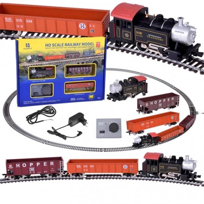 Ensemble de train électrique avec locomotive à vapeur classique et unité de contrôle
