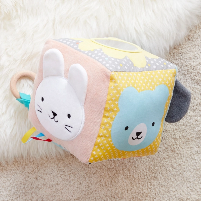 Petit Collage Cube textile moteur