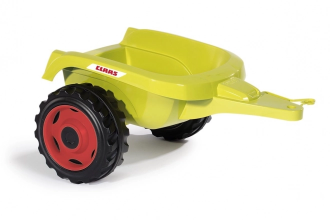 Tracteur à pédales CLAAS Arion 400 avec remorque verte