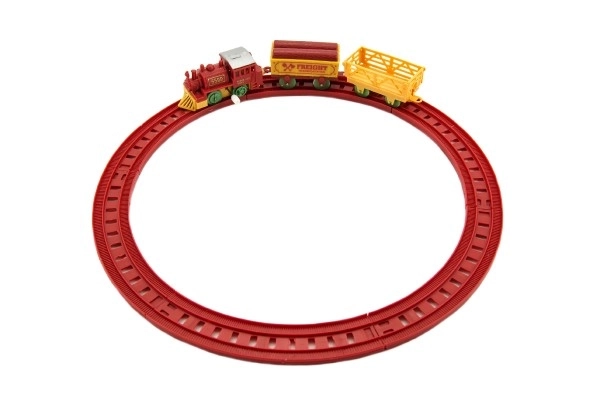 Train à clé avec deux wagons et pistes