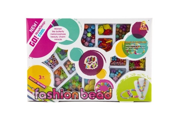 Perles en plastique colorées avec ficelle dans une boîte 26x17x2cm