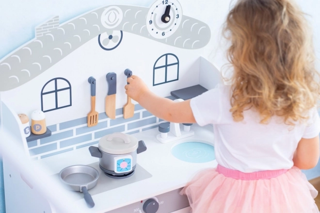 Cuisine en bois avec accessoires Maison