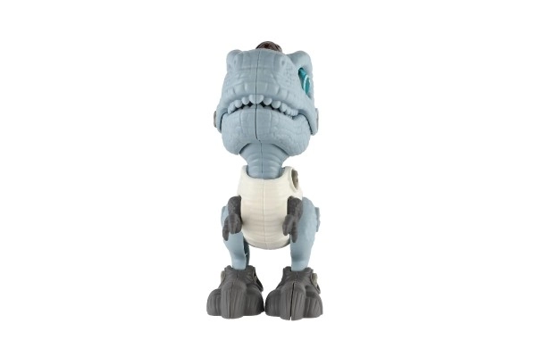 Dinosaure à visser en plastique 12 cm avec tournevis fonctionnant sur piles avec lumière et son dans une boîte 15x16x7 cm