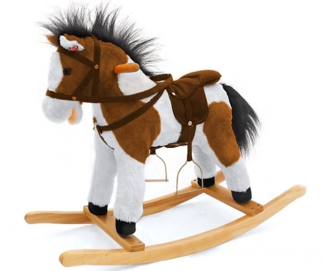 Cheval à bascule brun-blanc