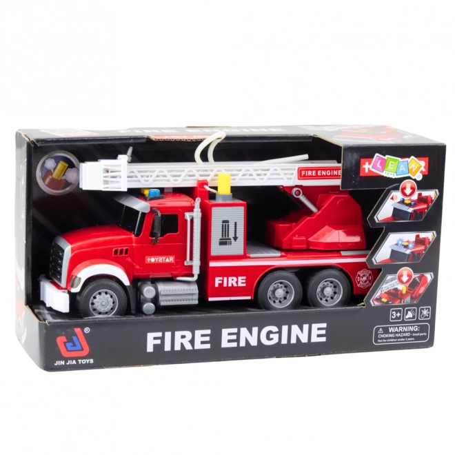 Grand camion de pompiers avec échelle extensible et fonction de jet d'eau