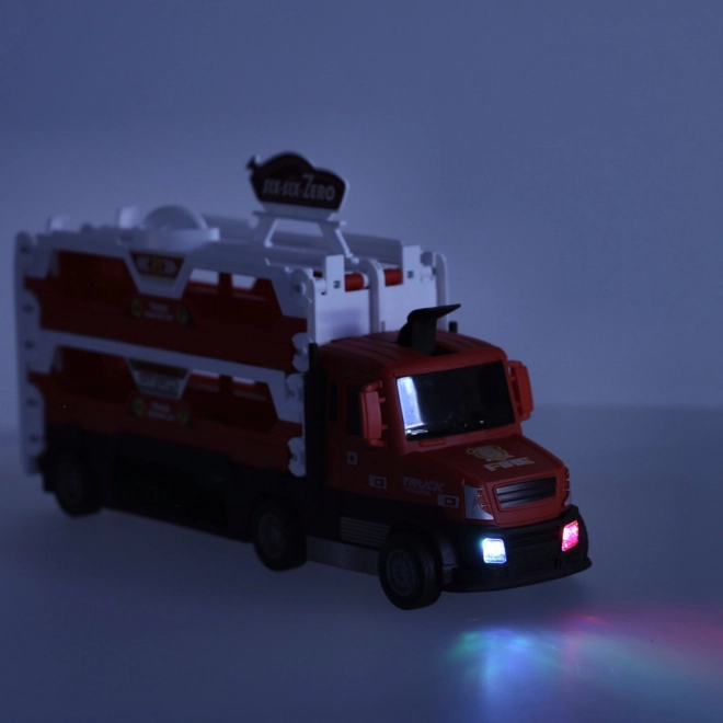 Camion rouge avec circuit caché et 6 petites voitures