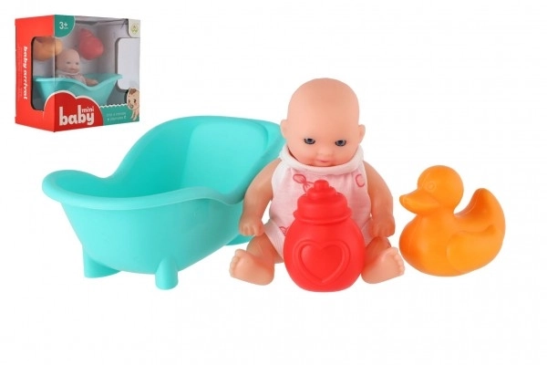 Poupée avec baignoire et accessoires