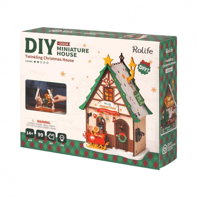 Miniature de la maison lumineuse de Noël