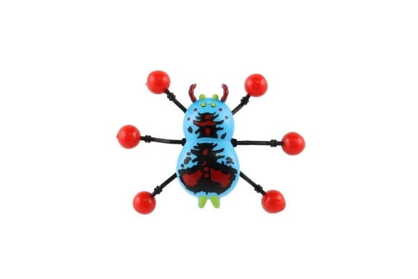 Araignée en plastique rampant sur verre 8x6cm 4 couleurs sur carte