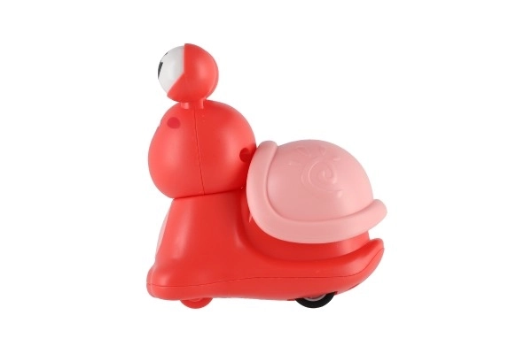 Escargot appuyez et partez plastique 8 cm à inertie 3 couleurs 12 pcs en boîte
