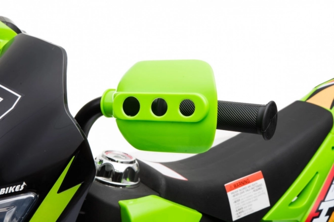 Moto cross électrique pour enfants à batterie – verte, avec roulettes stabilisatrices et feux LED