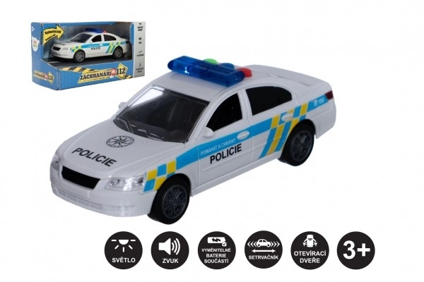 Voiture de police en plastique 15cm à piles avec son et lumière sur inertie en boîte 20x11x9cm