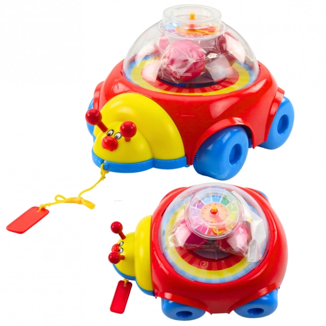 Coccinelle à tirer colorée avec balles et horloge
