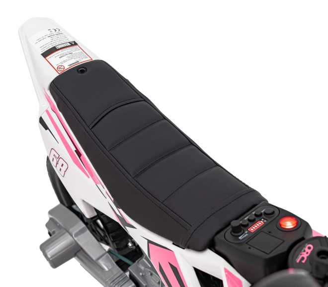 Moto électrique pour enfants rose avec panneau audio et fonction de démarrage libre