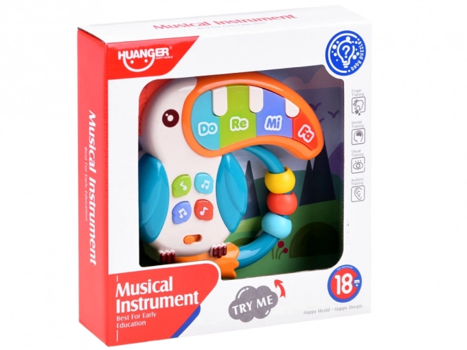 Jouet musical interactif toucan