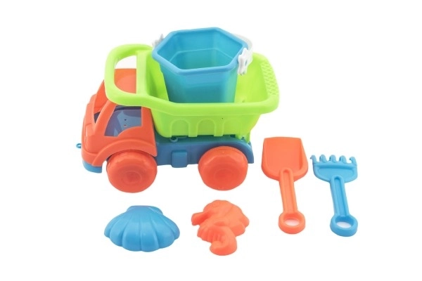 Camion de sable avec accessoires en plastique 16cm 2 couleurs dans le filet