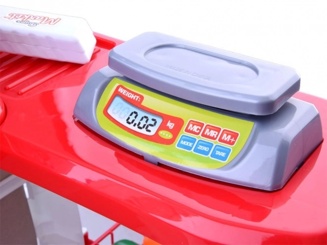 Supermarché pour enfants avec caisse et scanner