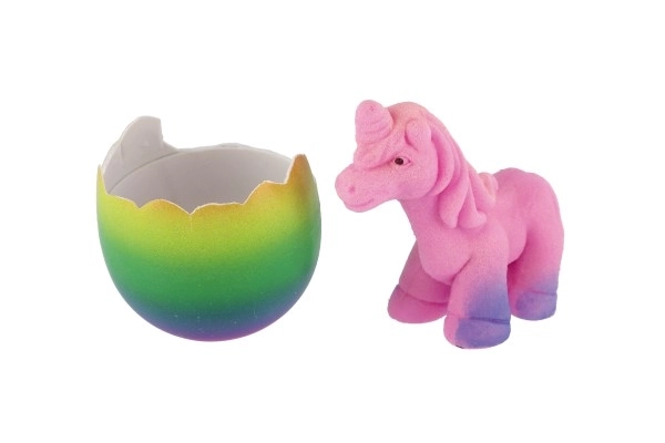 Œuf éclos et grandissant licorne plastique 7x10cm dans une boîte 9,5x13cm
