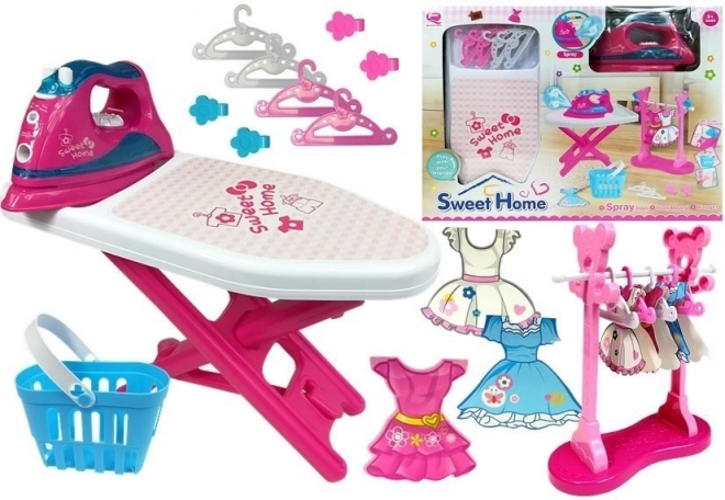 Set de repassage rose avec planche et cintres