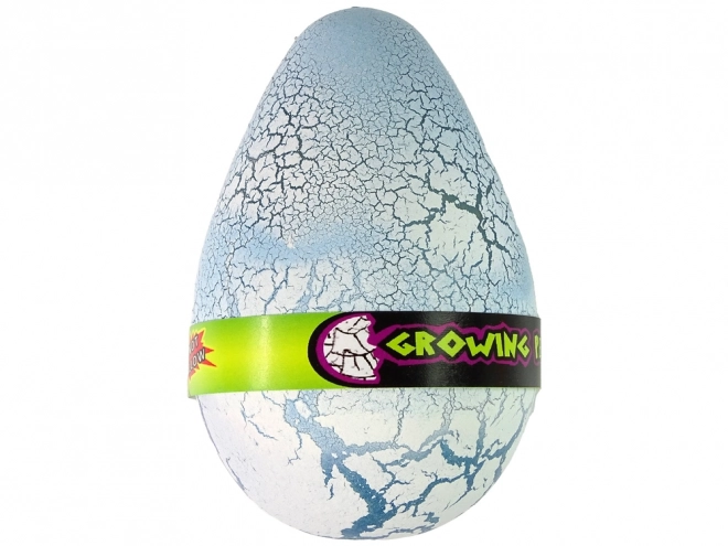 Œuf de dinosaure en croissance 12 cm