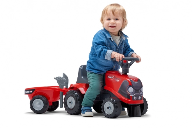 Tracteur à pédales Baby Case IH rouge avec remorque